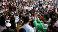 Aksi protes di New Delhi dihadiri oleh banyak demonstran. Para aktivis setempat menilai pemerintah India gagal dalam melindungi kaum wanita dan terlalu lamban dalam menyelidiki dan menangkap para pelaku pemerkosaan. Foto: REUTERS/Cathal McNaughton