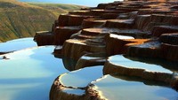 Bisa dibilang, Badab-e Surt ada sebuah mahakarya geologi yang langka. Kolam-kolam ini mengandung mineral yang mengalami proses pengendapan selama ribuan tahun. (ariadokhtoperator/Instagram)