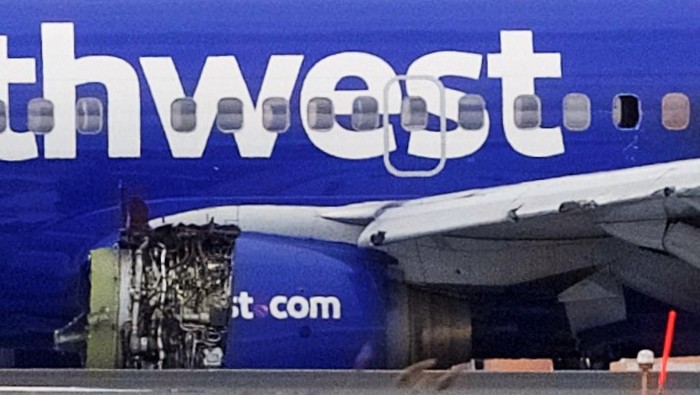 U.S. NTSB investigators are on scene examining damage to the engine of the Southwest Airlines plane in this image released from Philadelphia, Pennsylvania, U.S., April 17, 2018.    NTSB/Handout via REUTERS  ATTENTION EDITORS - THIS IMAGE HAS BEEN SUPPLIED BY A THIRD PARTY.     TPX IMAGES OF THE DAY