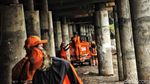 Pasukan Oranye Bersihkan Lautan Sampah di Kolong Tol Priok
