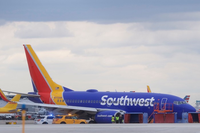 U.S. NTSB investigators are on scene examining damage to the engine of the Southwest Airlines plane in this image released from Philadelphia, Pennsylvania, U.S., April 17, 2018.    NTSB/Handout via REUTERS  ATTENTION EDITORS - THIS IMAGE HAS BEEN SUPPLIED BY A THIRD PARTY.     TPX IMAGES OF THE DAY