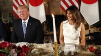 Trump dan Melania dalam jamuan makan malam. 