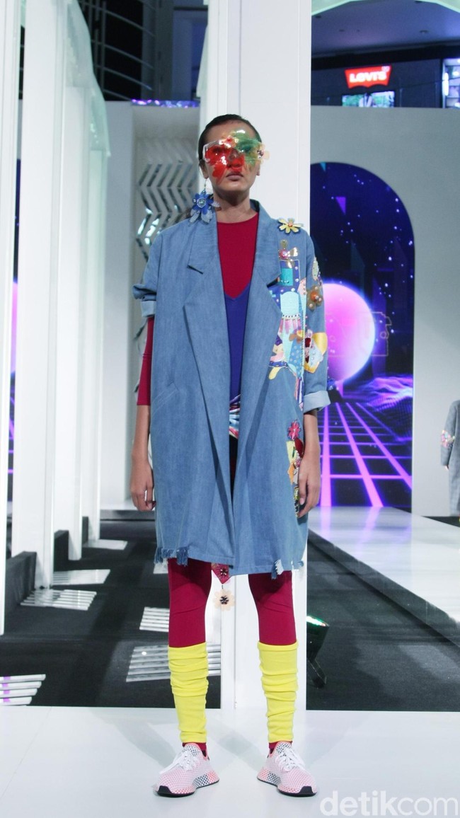 Desainer Mel Ahyar menghadirkan koleksi busananya dengan mengangkat tema Vignette di Fashion Nation 2018, Senayan City, Jakarta, Rabu [11/4/2018]. [Foto: Mohammad Abduh/Wolipop]