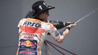 Kebangkitan kembali Marquez terjadi di MotoGP Austin, tempat dia mencatatkan 100% kemenangan sejak turun di MotoGP. Meski sempat dihukum mundur tiga grid, Marquez tetap tak tertahankan untuk meraih kemenangannya yang pertama. (Getty Images/Getty Images/AFP)