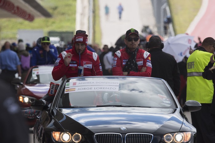AUSTIN, TX - APRIL 22:  Andrea Dovizioso of Italy and Ducati Team and Jorge Lorenzo of Spain and Ducati Team (R) look on during the MotoGP parade before the MotoGP race during the MotoGp Red Bull U.S. Grand Prix of The Americas - Race at Circuit of The Americas on April 22, 2018 in Austin, Texas.  (Photo by Getty Images/Getty Images)