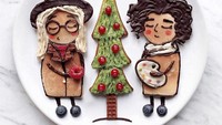 Pohon natal dan dua figur wanita imut ini terbuat dari pancake hangat lho. Hiasannya menggunakan lelehan cokelat manis. Foto: Instagram @darynakossar