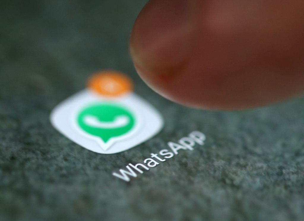 FILE PHOTO: The WhatsApp app logo is seen on a smartphone in this picture illustration taken September 15, 2017. REUTERS/Dado Ruvic