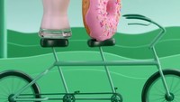 Lucu banget! Kali ini giliran donat yang mendapat kesempatan berkencan dengan segelas susu. Keduanya sengaja digambar sedang menaiki sepeda. Tanpa memegang setang dan mengayuh, sepedanya masih tetap melaju. Foto: Instagram @kylejbean