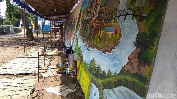 Anak-anak Muda yang Memulas Tembok Penahan Banjir Bengawan Solo