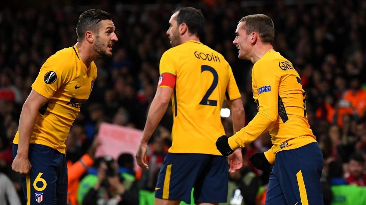 Atletico Madrid mampu menahan Arsenal 1-1 meski kalah jumlah pemain (Foto: Dylan Martinez/Reuters)