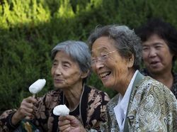 Potret Senyuman Menawan Warga Korea Utara