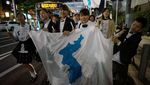 Momen Kegembiraan Warga Korea di Jepang Atas Pertemuan Kim-Moon