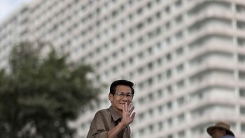 Pria yang memberikan sapaan dengan senyum ramahnya. (Foto: Eric Lafforgue)