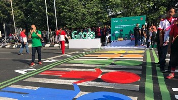 Penampakan zebra cross di kota Semarang, Minggu (29/4/2018), yang dihiasi dengan seni mural oleh Grab dan sejumlah seniman lokal. Istimewa.