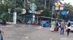 Foto: Sampah Sisa Acara Sembako di Monas Masih Dibersihkan