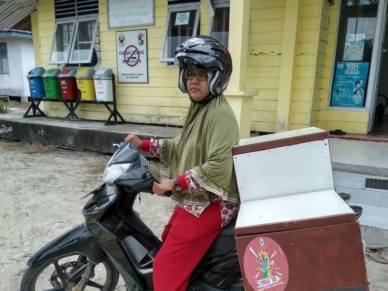 Pakai Sepeda Motor, Sri Susuri Pelosok Riau Cegah Tuberkulosis Pakai Sepeda Motor, Sri Susuri Pelosok Riau Cegah Tuberkulosis