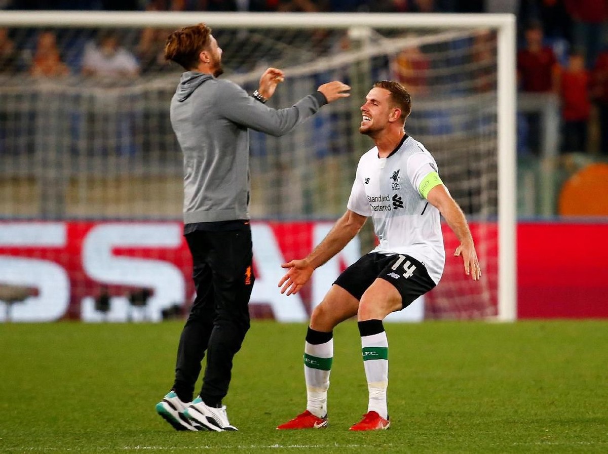Juergen Klopp merayakan keberhasilan ke final Liga Champions bersama Jordan Henderson. (Foto: Tony Gentile/Reuters)