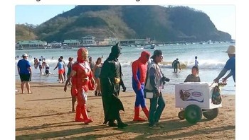Kalau di sini, superhero dari DC dan Marvel terlihat akur santai di pantai sambil membuat film bareng. (Foto: Twitter)