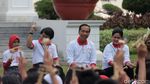 Foto: Ekspresi Ceria Jokowi Saat Main Bareng Anak-anak di Istana