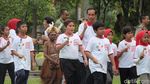 Foto: Ekspresi Ceria Jokowi Saat Main Bareng Anak-anak di Istana