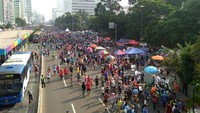 Warga memenuhi Jalan Sudirman yang menjadi tempat area CFD (Foto: Yuni Ayu Amida/detikcom)