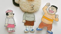 Siapa bisa tebak karakter rice ball di tengah? Ya, inilah ibu Giant dan Jaiko di serial kartun Doraemon. Hidungnya yang bundar kok bikin gemas! Foto: Instagram horiharu1213