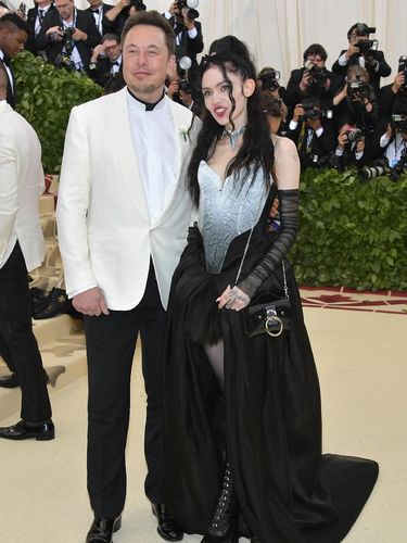NEW YORK, NY - MAY 07:  Elon Musk and Grimes attend the Heavenly Bodies: Fashion & The Catholic Imagination Costume Institute Gala at The Metropolitan Museum of Art on May 7, 2018 in New York City.  (Photo by Neilson Barnard/Getty Images)