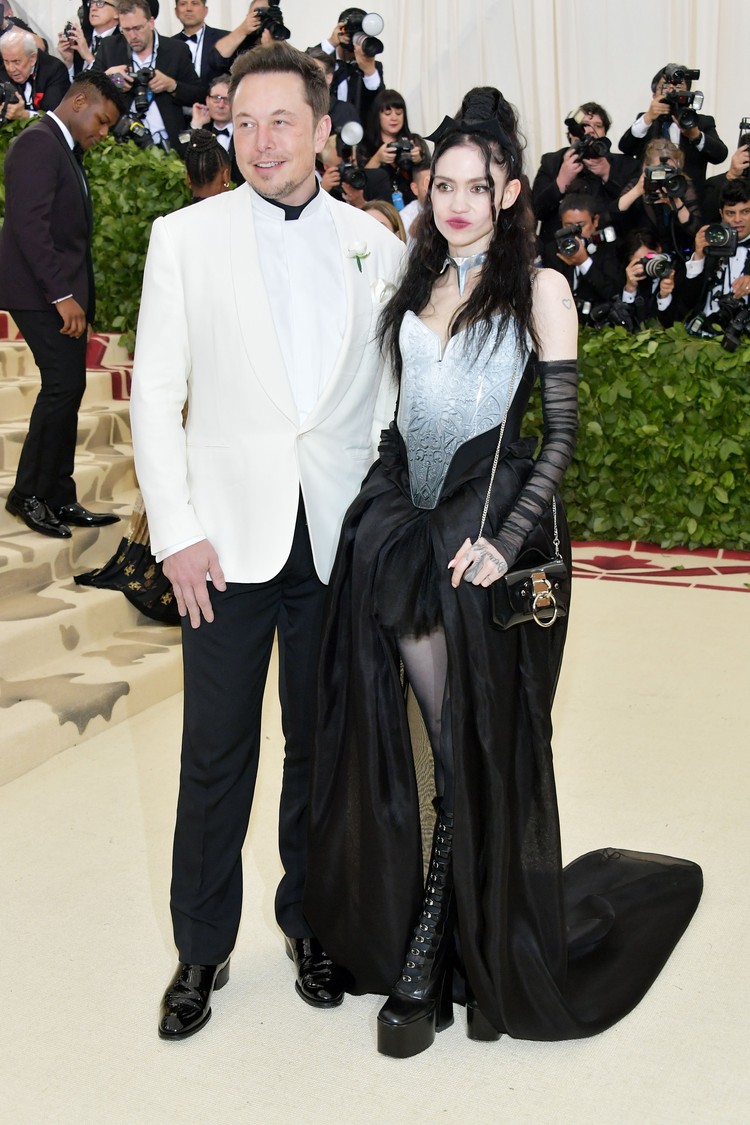Claire Elise Boucher & Elon Musk CHICAGO, IL - JULY 20: Grimes performs during Pitchfork Music Festival at Union Park on July 20, 2014 in Chicago, Illinois. (Photo by Daniel Boczarski/Getty Images for Ketel One)