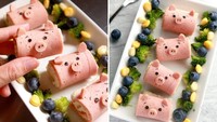 Ini roti gulung ham berbentuk babi yang lucu. Si kecil dijamin suka kalau dibawain bekal ini. Foto: Instagram @foodmakesfun