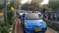 Foto: Aksi ini mengakibatkan kemacetan di sejumlah titik. Macet parah terjadi sampai Jl Metro Pondok Indah. Fotografer: Carlo Venansius Homba/detikcom