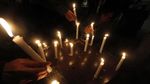 Aksi Lilin GAMKI untuk Korban Bom Surabaya