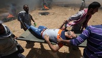 Pihak pemerintah Palestina menyebut bentrokan tersebut sebagai pembantaian. Palestina mengecam keras hal tersebut. Ibraheem Abu Mustafa/Reuters.