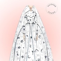 Huishan Zhang melihat gaun Meghan Markle dengan siluet modern namun timeless dengan lembaran kain lace. Foto: Dok. WWD