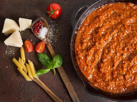Spaghetti Bolognaise Sauce  in the Pot on the wooden table