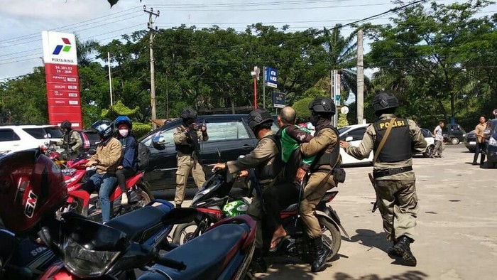 Motret Brimob Patroli, Ojol Diamankan di Palembang