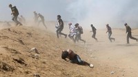 Selama enam minggu terakhir, warga Palestina telah mengadakan demonstrasi di perbatasan Gaza untuk kembalinya para pengungsi Palestina ke daerah-daerah yang sekarang menjadi bagian dari Israel. REUTERS/Ibraheem Abu Mustafa.