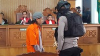 Aman Abdurrahman tampak mengenakan pakaian tahanan berwarna oranye (Foto: Zunita Amalia Putri/detikcom)