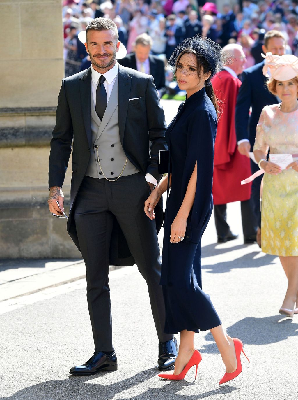David and Victoria Beckham arrive at St George's Chapel at Windsor Castle for the wedding of Meghan Markle and Prince Harry. Saturday May 19, 2018.  Ian West/Pool via REUTERS