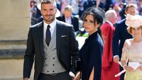 Banyak yang menunggu momen kemesraan Beckham dan Victoria. Ian West/Pool via REUTERS