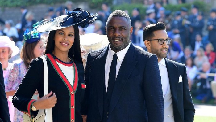 Idris Elba and Sabrina Dhowre arrives at St Georges Chapel at Windsor Castle for the wedding of Meghan Markle and Prince Harry.  Saturday May 19, 2018.  Ian West/Pool via REUTERS