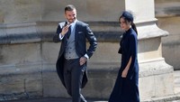 David Beckham tampak hadir bersama sang istri, Victoria Beckham di St George Chapel, Windsor, Inggris pada Sabtu (19/5). REUTERS/Toby Melville/Pool