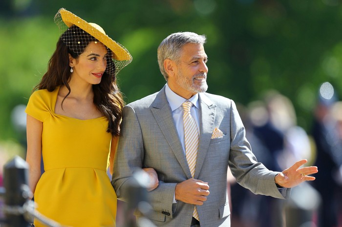 George Clooney Amal Clooney and George Clooney arrive at St Georges Chapel at Windsor Castle for the wedding of Meghan Markle and Prince Harry. Saturday May 19, 2018. Gareth Fuller/Pool via REUTERS