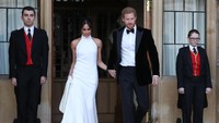 Meghan Markle dan Pangeran Harry berganti baju untuk resepsi. Foto: Reuters