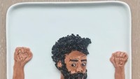 Kalau ini wajah penyanyi Childish Gambino yang tengah hangat diperbincangkan di Amerika, karena merilis lagu tentang Amerika yang powerful. Ini terbuat dari yogurt lho. Foto: Instagram @harleysfood_art
