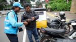 Transaksi Parkir Online di Taman Barito