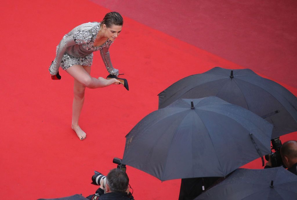 CANNES, FRANCE - MAY 12:  Kirsten Stewart and Lea Seydoux walk the red carpet in protest of the lack of female filmmakers honored throughout the history of the festival at the screening of 