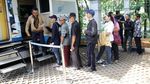 Antre Panjang dan Berpanas-panasan Demi Tukar Uang Baru
