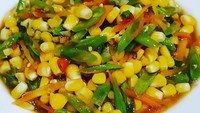 Masih soal tumis sayur, kali ini jagung, buncis, dan wortel jadi satu dalam satu piring. Rasanya pasti manis gurih. Foto: Instagram dahlia_ayin