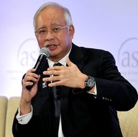 Jam tangan mewah menjadi aksesori wajib Najib Razak untuk menyempurnakan gaya necisnya. Satu dari koleksinya adalah jam Audemars Piguet seri Royal Oak Offshore yang Najib pakai saat menghadiri sebuah konferensi internasional di Kuala Lumpur beberapa tahun lalu. (Foto: Istimewa)