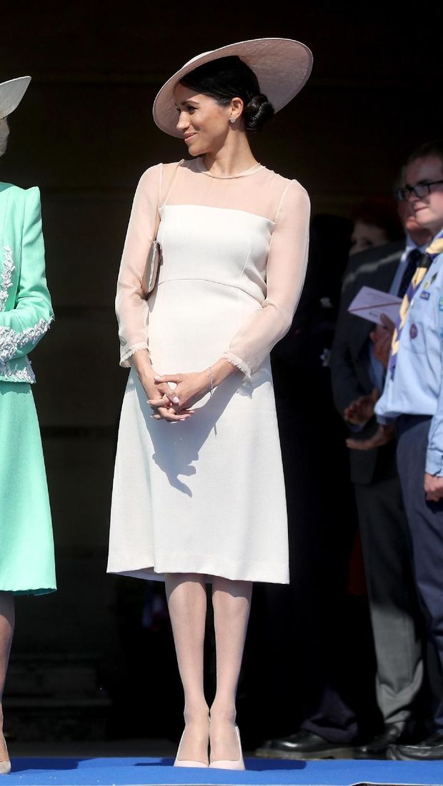 Meghan Markle dalam balutan gaun dari label Goat.